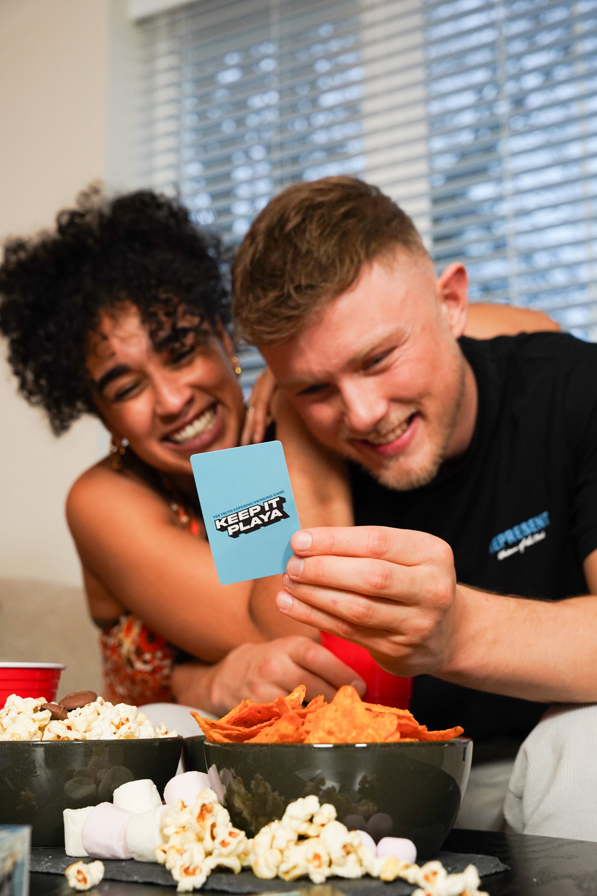 image of male and female playing Keep It Playa original edition